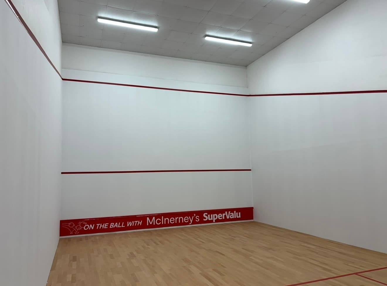 Squash court walls refinished to a smooth, even surface